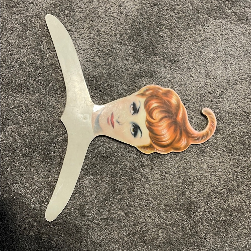 Vintage Hair Styling Tool with Retro Design